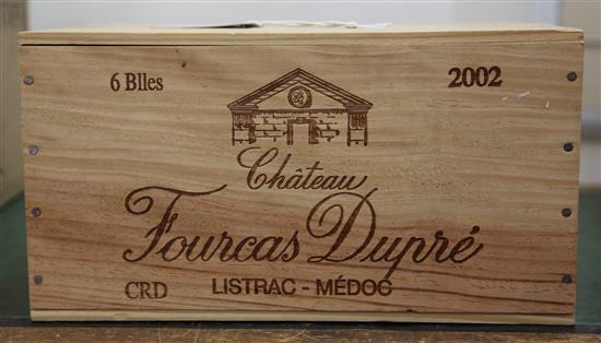 Six bottles of Chateau Fourcas Dupre, 2002, in unopened original wooden box.